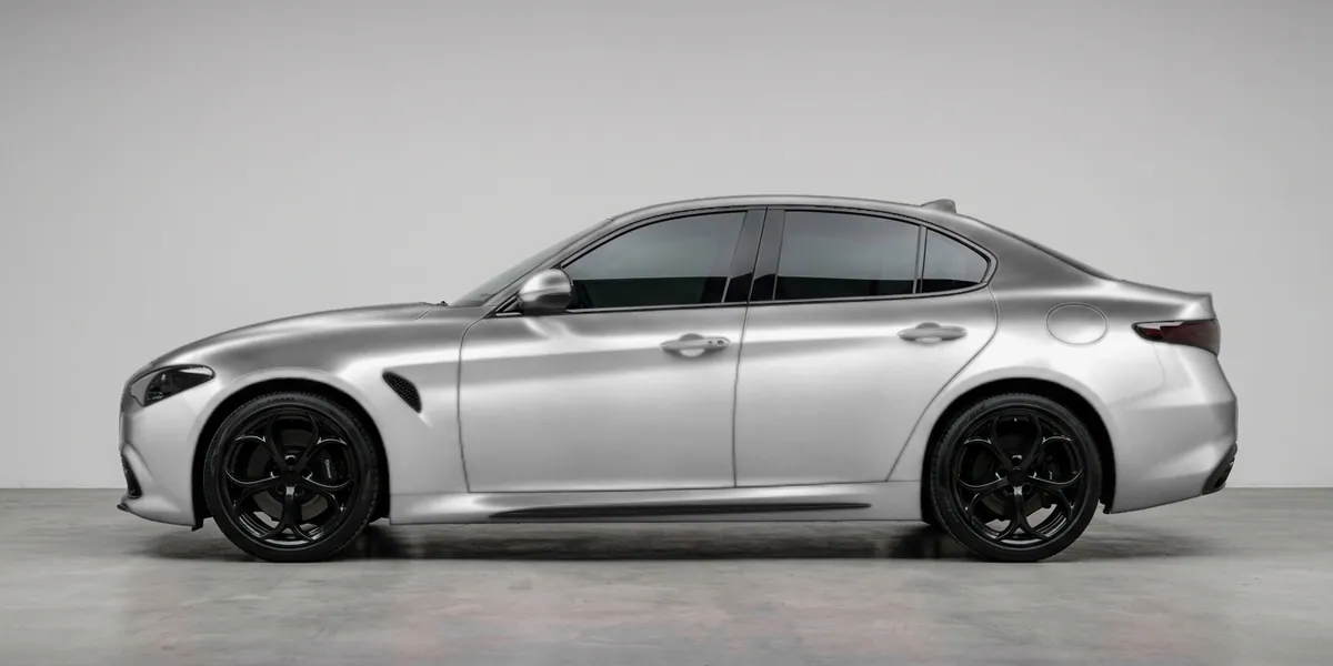Studio render of a sedan in side view, wrapped in the color and finish picked below