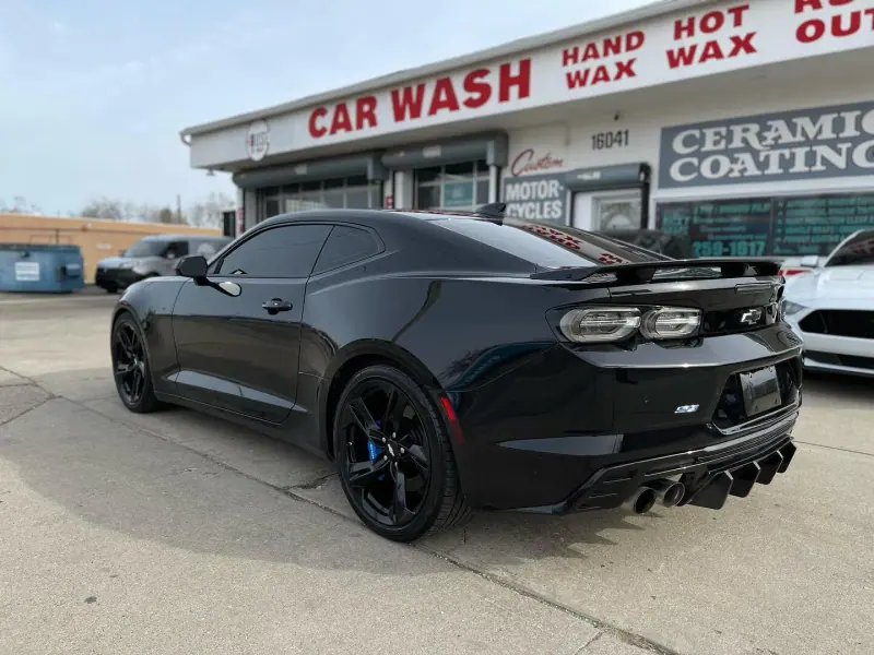 Black Chevy Camaro, rear view