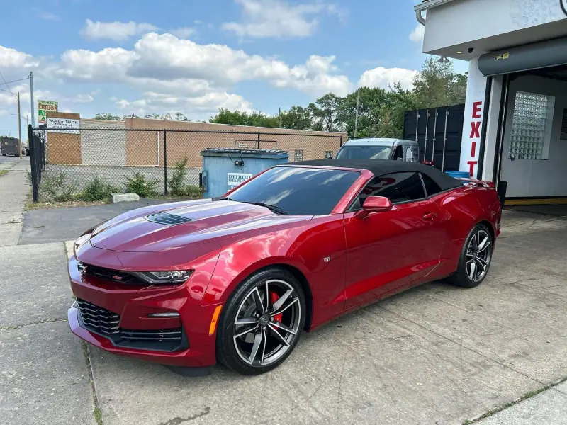 Red Chevy Camaro SS, front three quarter view