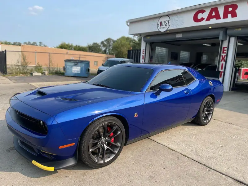 Blue Dodge Challenger, front three quarter view