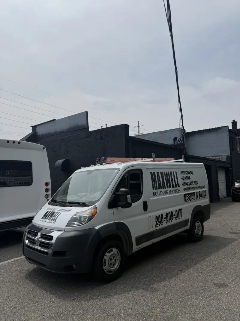 White Ram ProMaster van with black Maxwell Building Services lettering, front three quarter view