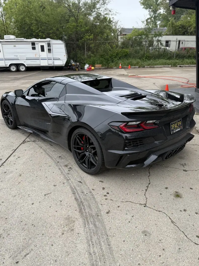 Black Chevy Corvette C8, rear three quarter view
