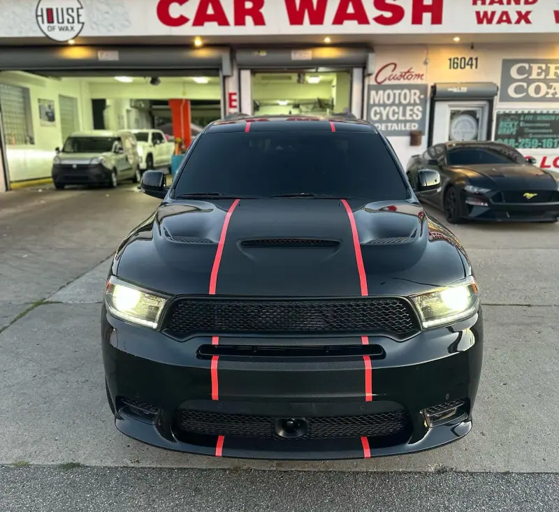Black Dodge Durango with red pinstripes, front view