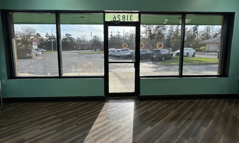 Storefront windows after window film, seen from inside