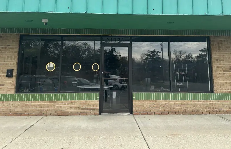 Storefront windows before window film