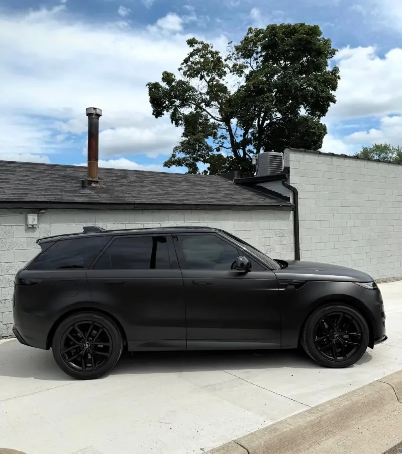 Matte black Range Rover Sport, side view